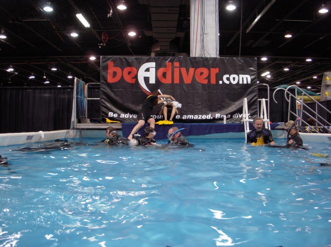 See what it's like to scuba dive in the middle of a convention hall!